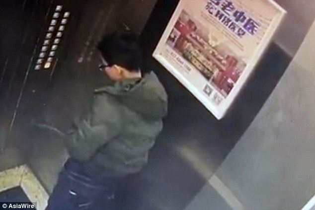 chinese boy trapped elevator 