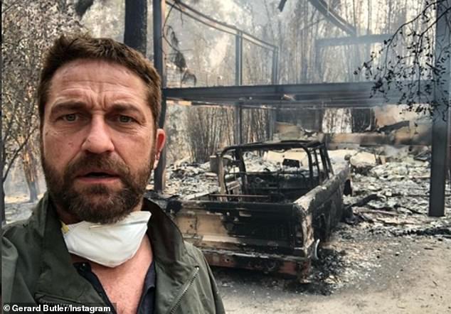 Gerard Butler selfie with burned house and car