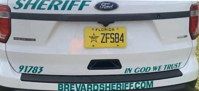 sheriff god trust patrol car